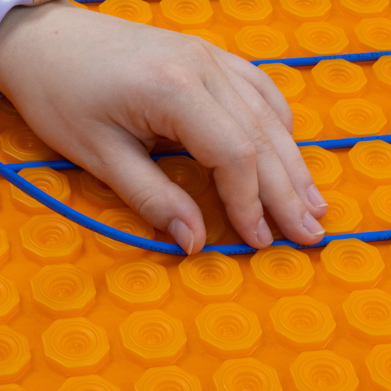 Self-Adhesive Decoupling Membrane for Under Tile Underfloor Heating